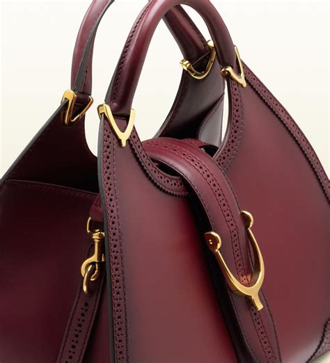 gucci bag with handle|gucci stirrup top handle bag.